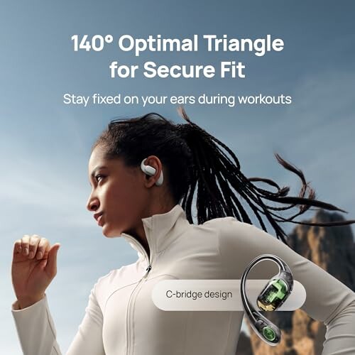 Woman wearing earbuds with secure fit design for workouts