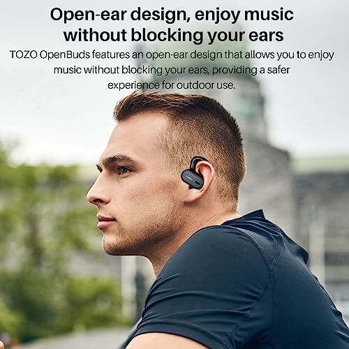 Man wearing open-ear design earbuds outdoors.