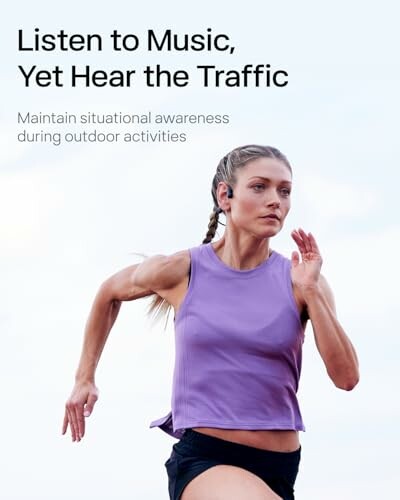Woman running with headphones, emphasizing situational awareness.
