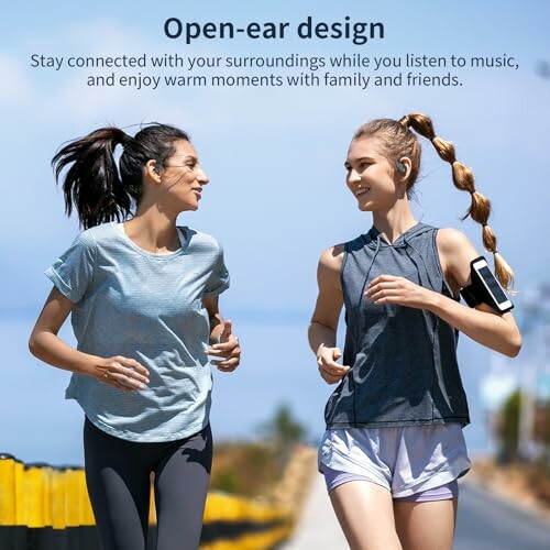 Two women jogging with open-ear headphones.